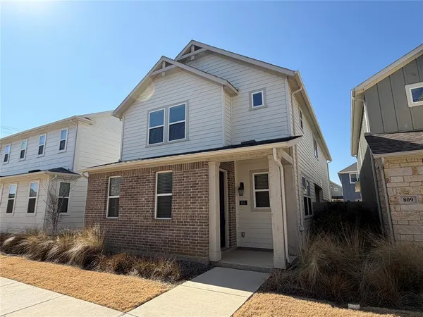 a front view of a house with balcony