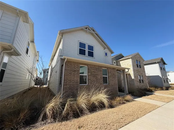 a front view of a house with garage