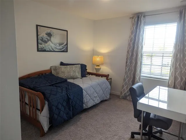 a view of a lake from a balcony