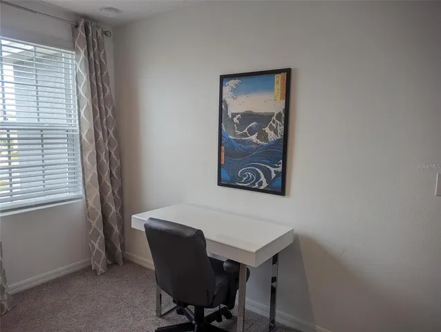 a view of a garden with a lake view