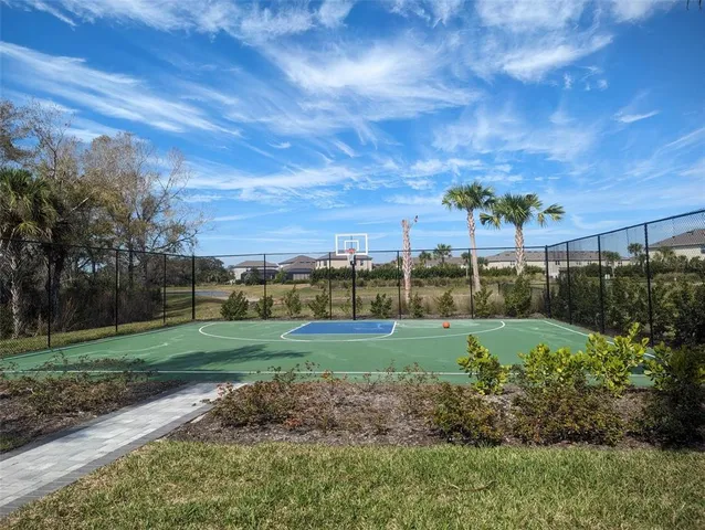 a view of a park with swings and slides