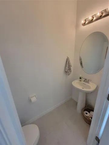 a room with table and chairs