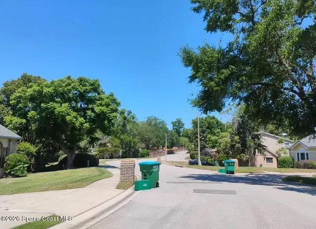 a view of a street with houses