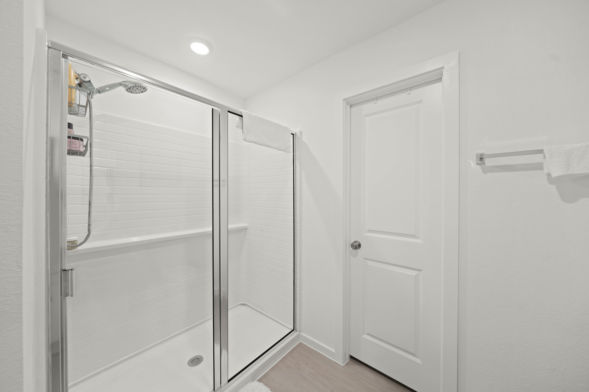 26235 Arrowleaf Drive Magnolia, TX 77355 - Photo 24 of 32 a bathroom with a shower and a glass door