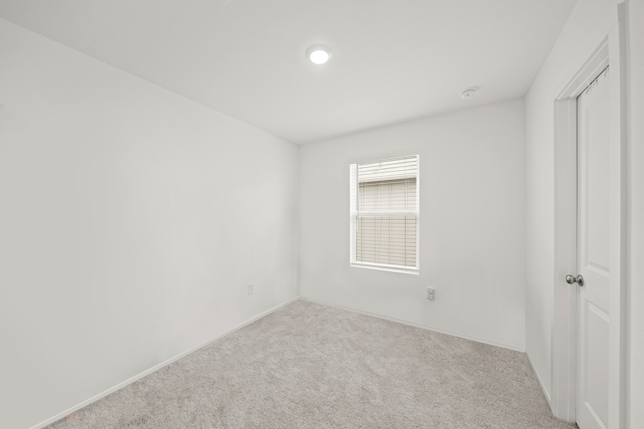 26235 Arrowleaf Drive Magnolia, TX 77355 - Photo 27 of 32 an empty room with a window