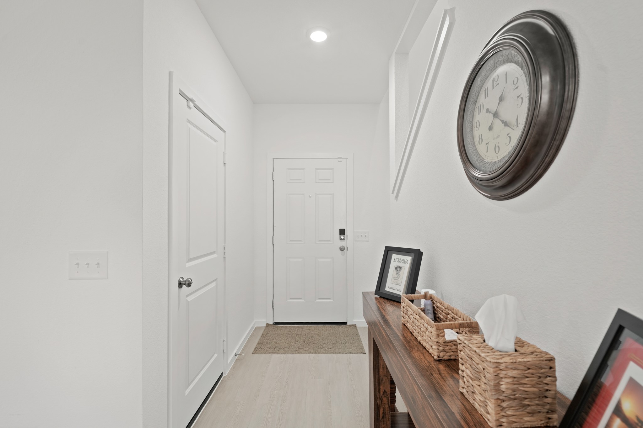 26235 Arrowleaf Drive Magnolia, TX 77355 - Photo 5 of 32 a view of a hallway with washer and dryer