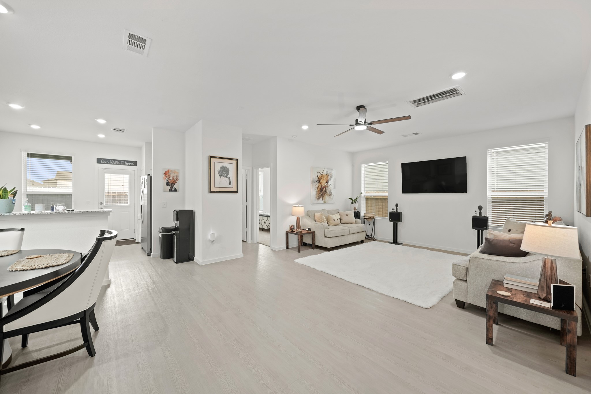 26235 Arrowleaf Drive Magnolia, TX 77355 - Photo 6 of 32 a living room with furniture and a flat screen tv