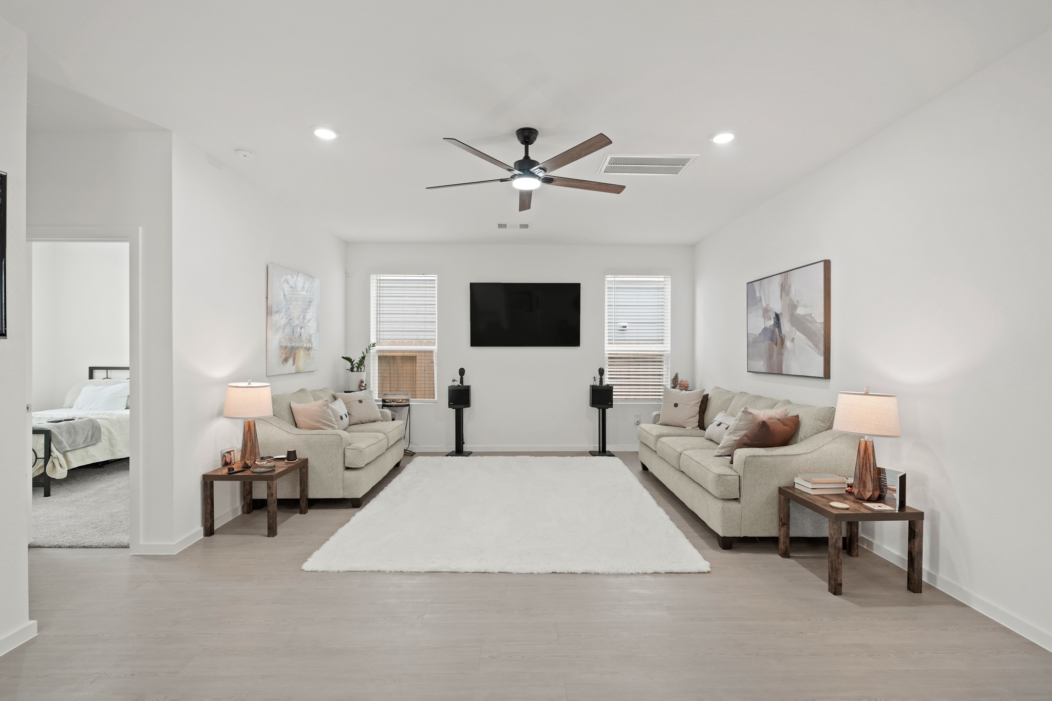 26235 Arrowleaf Drive Magnolia, TX 77355 - Photo 9 of 32 a living room with furniture and a flat screen tv