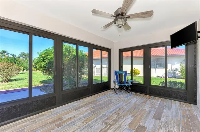 a bedroom with a bed and a night stand