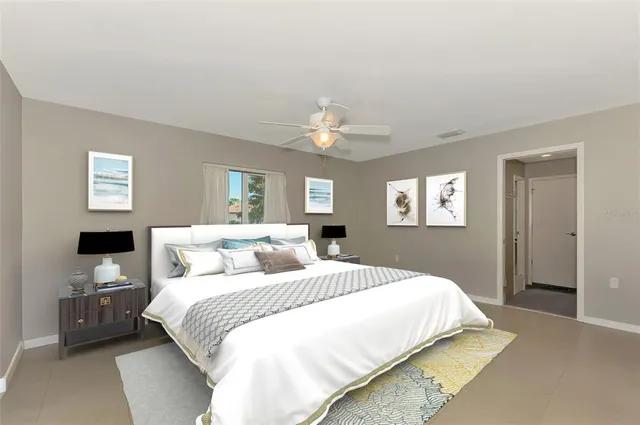 a bathroom with a granite countertop double vanity sink mirror and