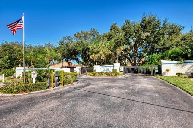 an aerial view of a house with a lake view