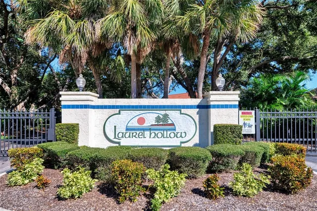 an aerial view of a house with outdoor space swimming pool and mountains