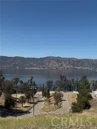 a view of a lake with mountain
