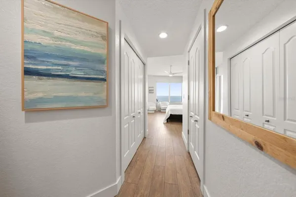 a view of a bathroom with a sink and a mirror