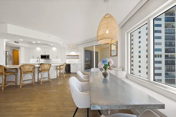 a view of a dining room with furniture