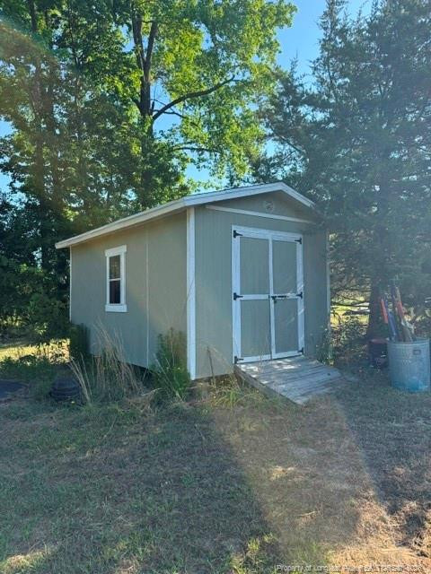 1284 L L Cooper Road Cameron, NC 28326 - Photo 23 of 24 a view of backyard and space