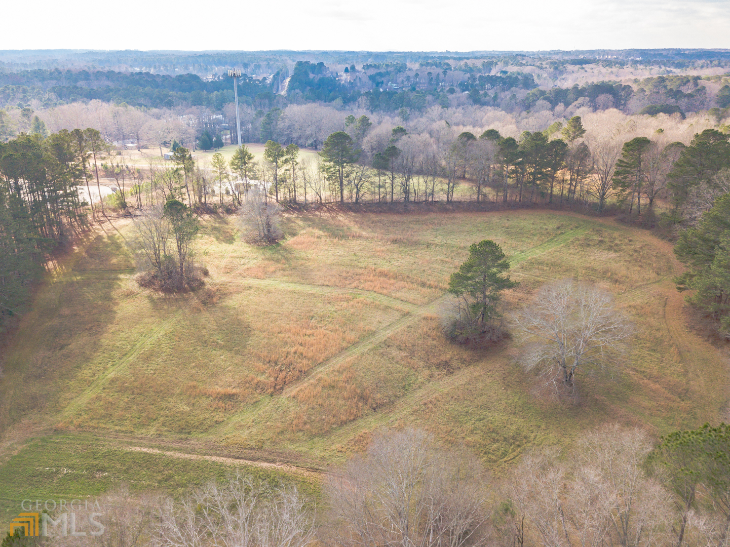 928 Grayson New Hope Road Lawrenceville, GA 30045 - Photo 12 of 36 a view of a lake with mountains in the background