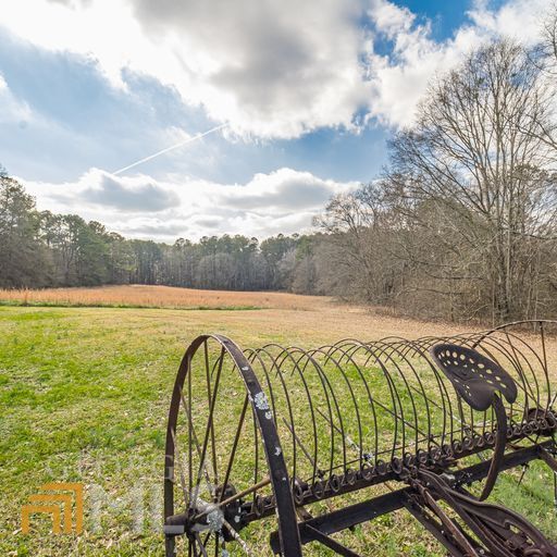 928 Grayson New Hope Road Lawrenceville, GA 30045 - Photo 18 of 36 a view of swimming pool with a yard