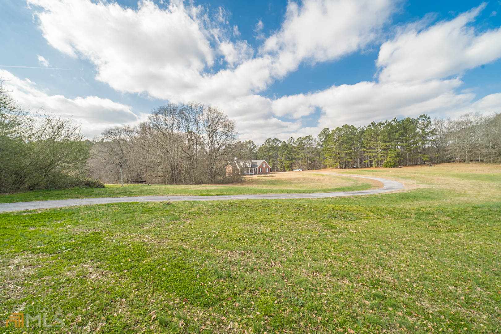 928 Grayson New Hope Road Lawrenceville, GA 30045 - Photo 20 of 36 a view of an outdoor space and a yard