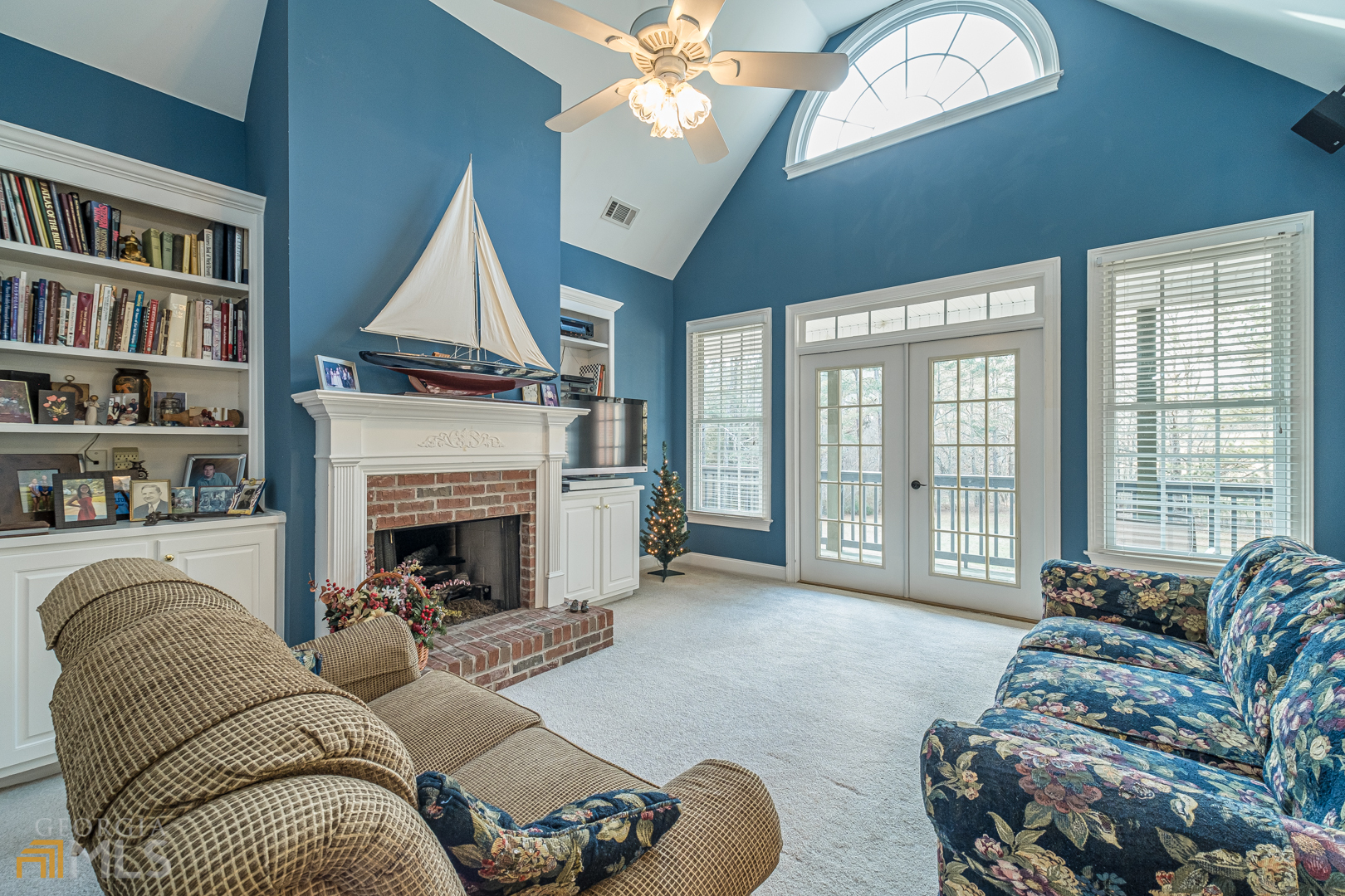 928 Grayson New Hope Road Lawrenceville, GA 30045 - Photo 23 of 36 a living room with furniture fireplace and a large window