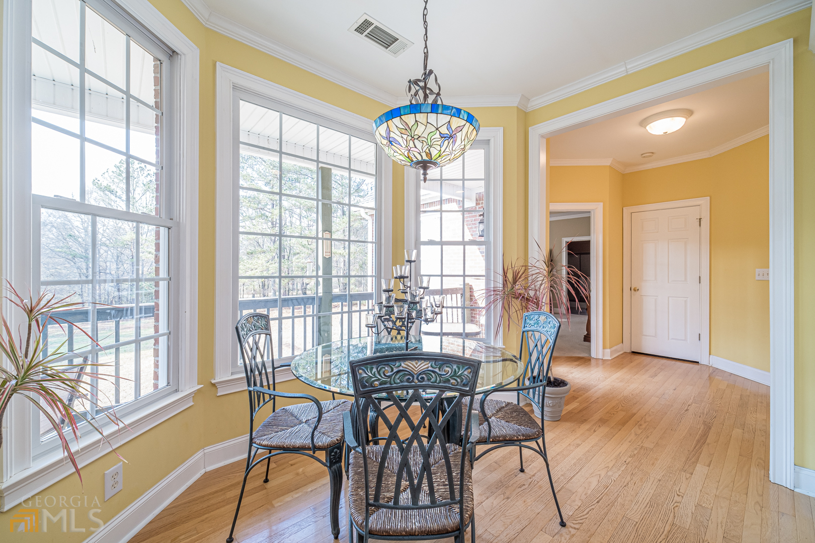 928 Grayson New Hope Road Lawrenceville, GA 30045 - Photo 27 of 36 a view of a dining room with furniture window and wooden floor