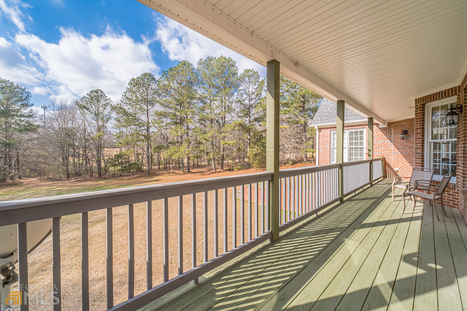 928 Grayson New Hope Road Lawrenceville, GA 30045 - Photo 30 of 36 a view of balcony with wooden floor