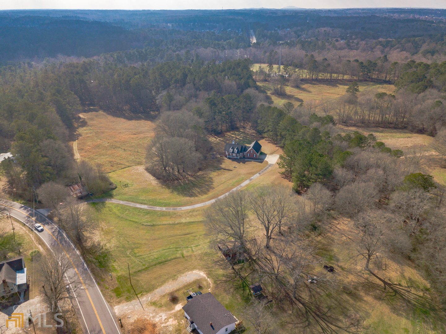 928 Grayson New Hope Road Lawrenceville, GA 30045 - Photo 3 of 36 a view of a lake view