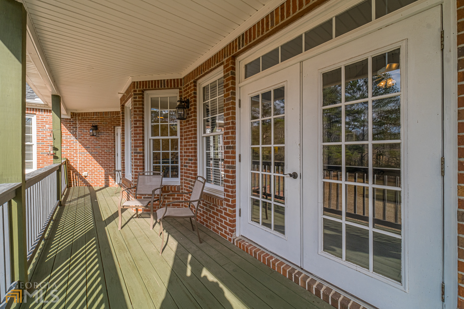 928 Grayson New Hope Road Lawrenceville, GA 30045 - Photo 31 of 36 a view of balcony with wooden floor and furniture