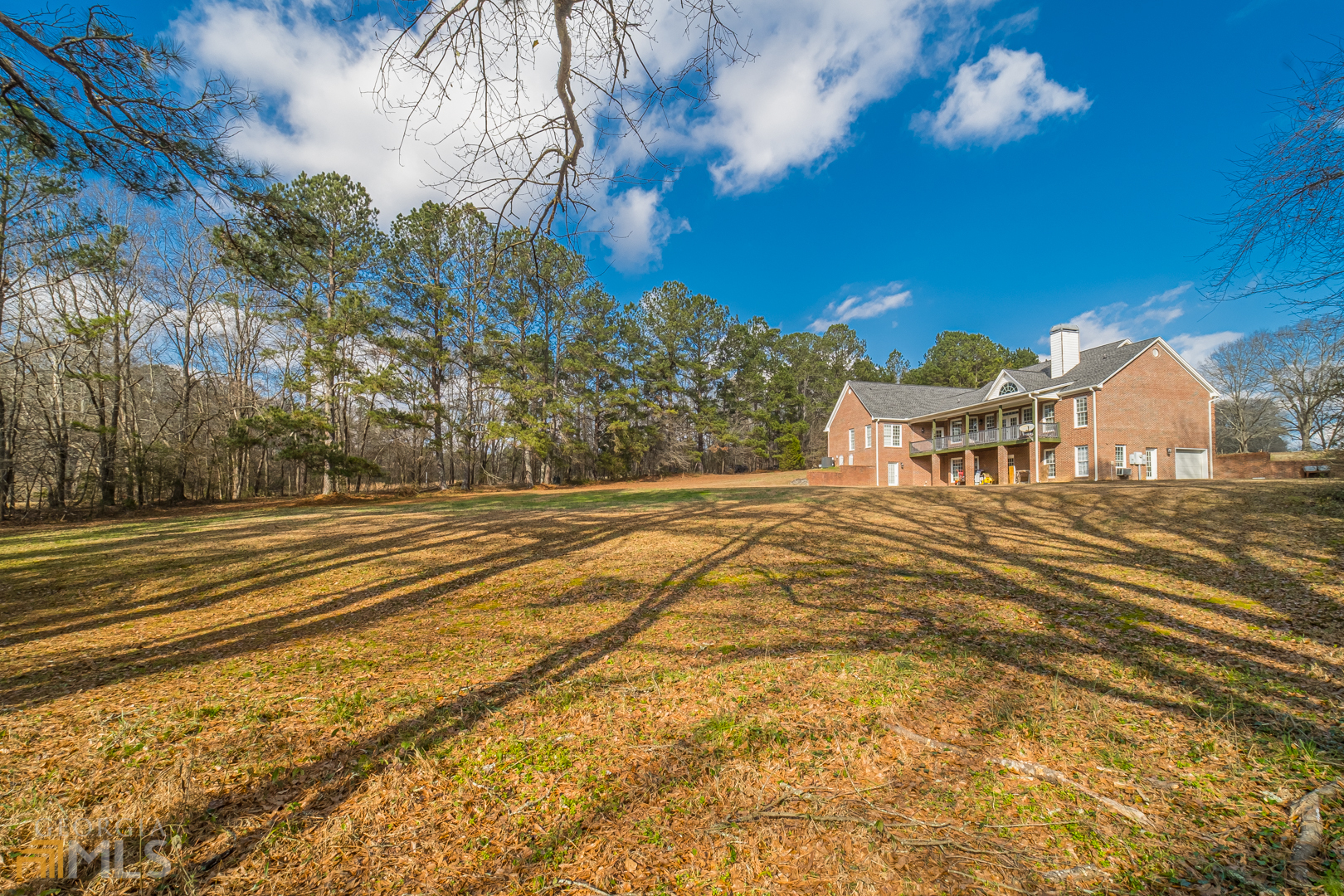 928 Grayson New Hope Road Lawrenceville, GA 30045 - Photo 34 of 36 a view of a house with a yard