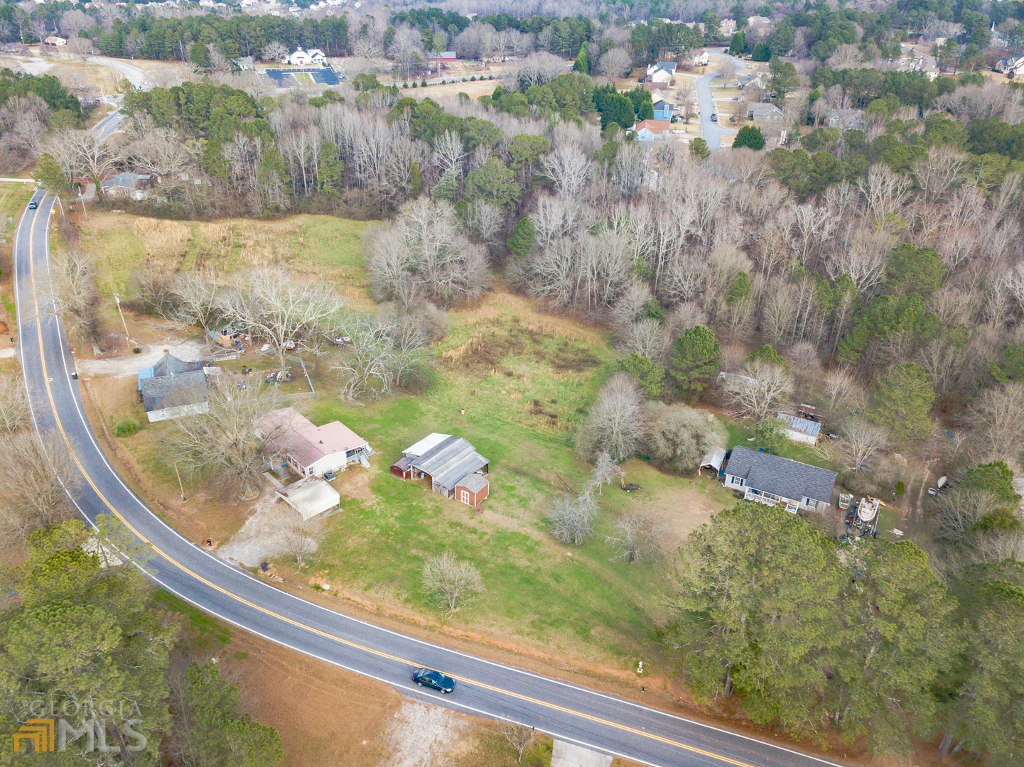 928 Grayson New Hope Road Lawrenceville, GA 30045 - Photo 6 of 36 a view of swimming pool from a window