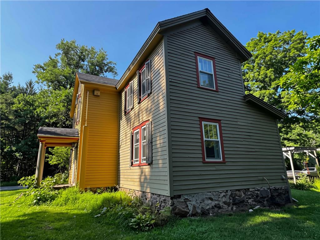 108 Effort Neola Road Effort, PA 18330 - Photo 31 of 31 A charming dwelling with a stone foundation and contrasting siding offers picturesque curb appeal.