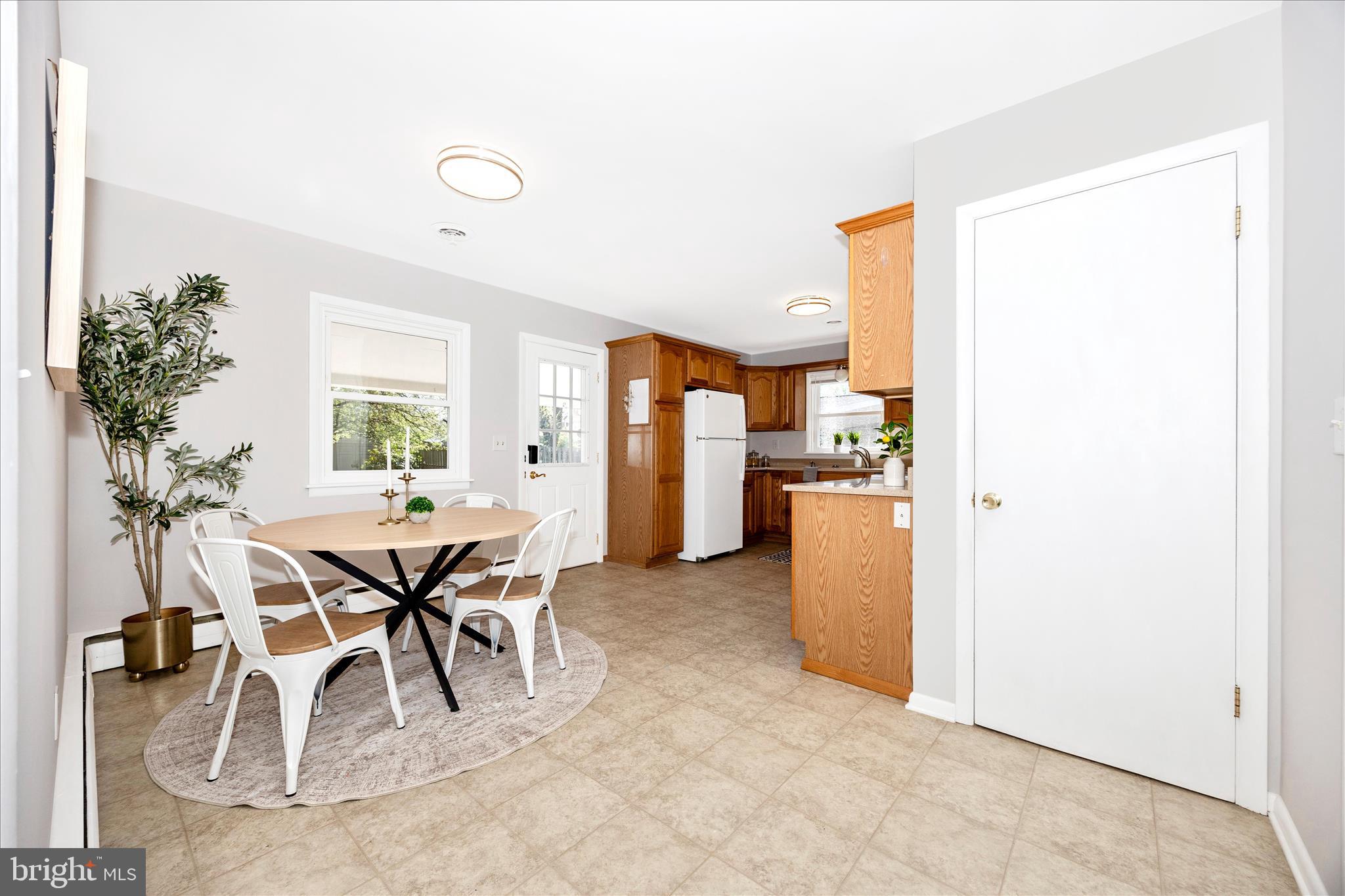 504 Valley Street Frederick, MD 21701 - Photo 11 of 49 Spacious eat-in kitchen. Basement door stairs