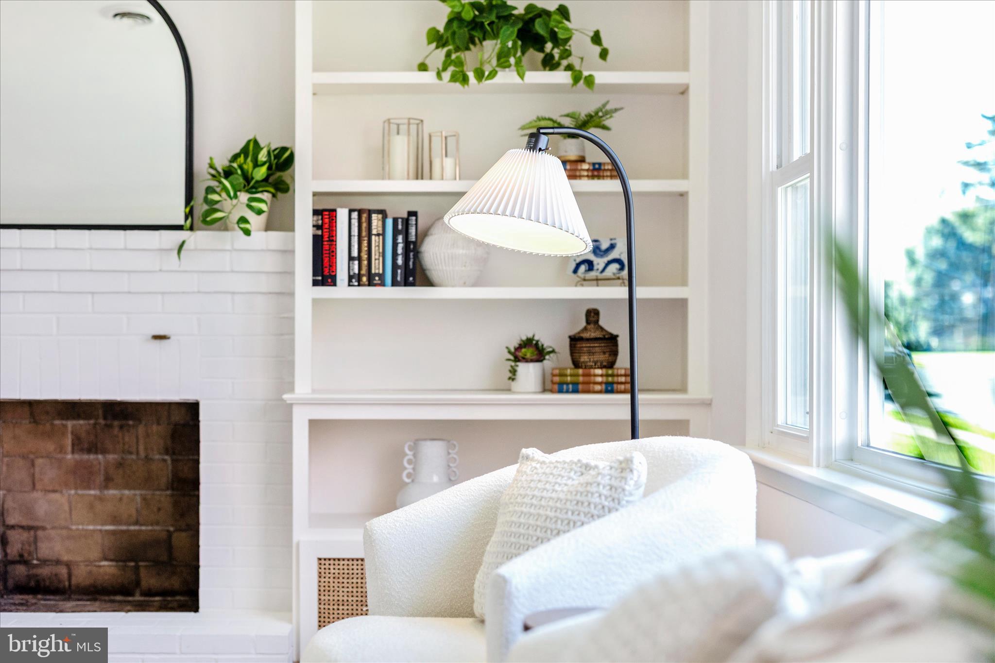 504 Valley Street Frederick, MD 21701 - Photo 10 of 49 Bookshelves flank the brick fireplace