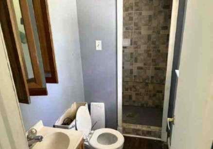 1190 Asphalt Rock Road Cherokee, AL 35616 - Photo 12 of 13 a bathroom with a shower and a sink