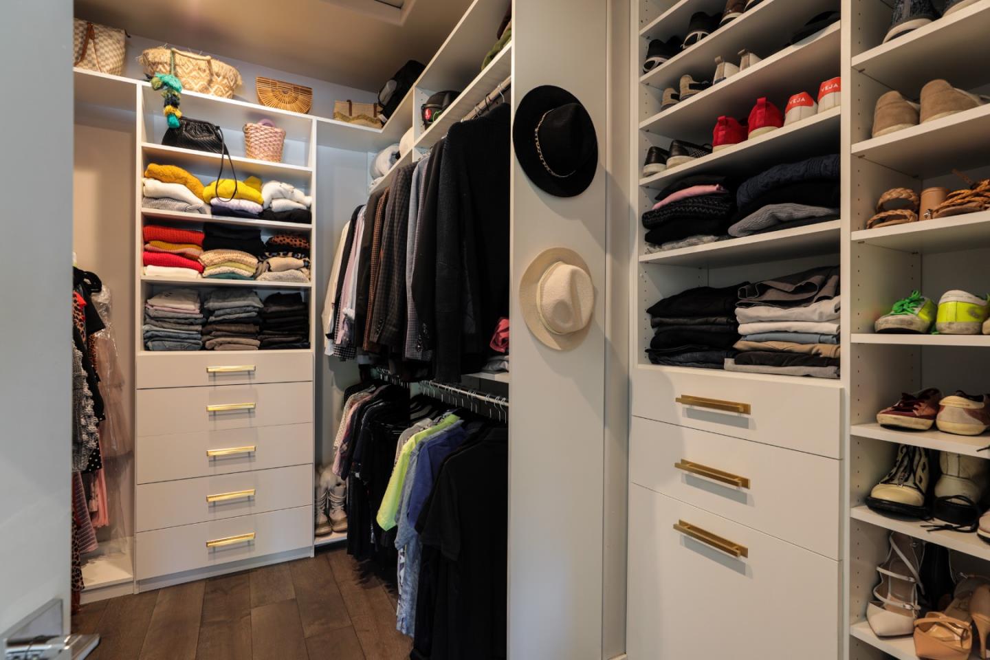 818 Crossway Road Burlingame, CA 94010 - Photo 13 of 50 a view of walk in closet with clothes and shoes