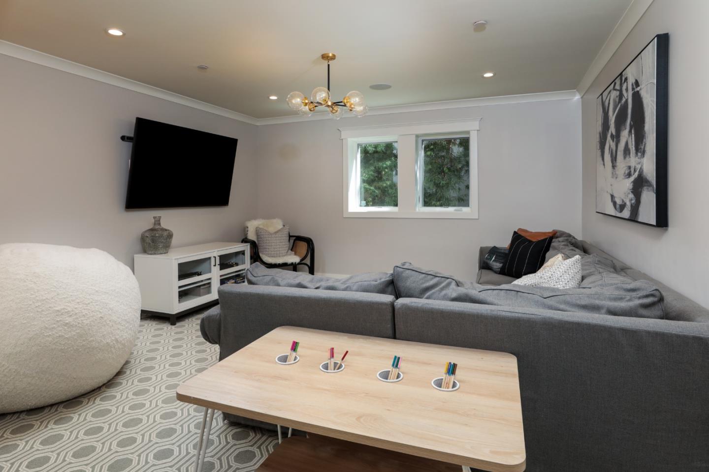 818 Crossway Road Burlingame, CA 94010 - Photo 20 of 50 a living room with furniture and a flat screen tv