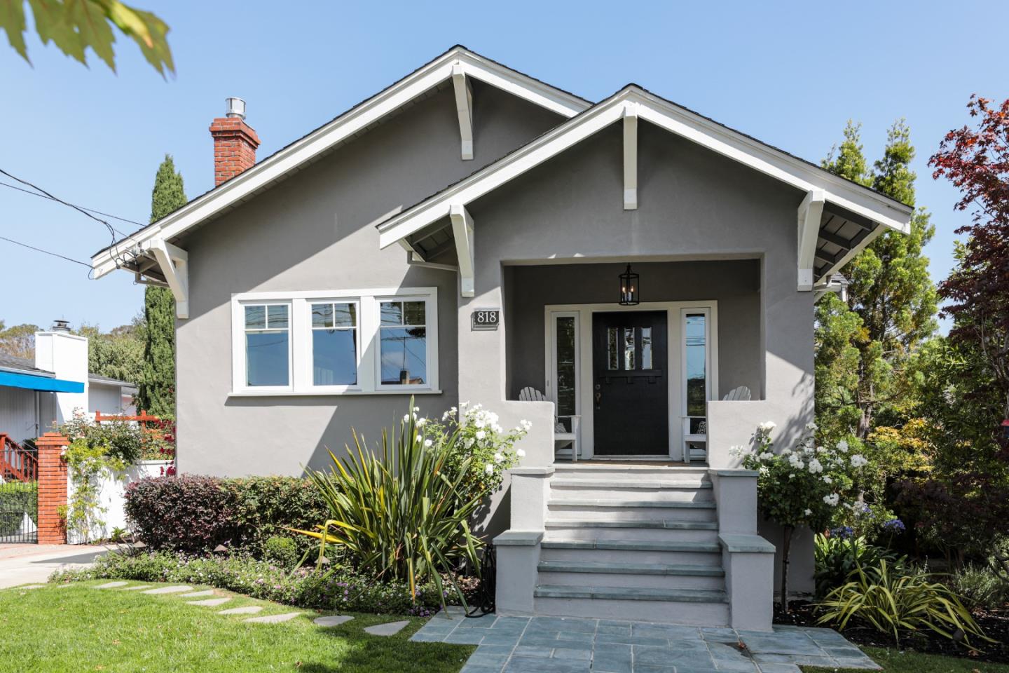 818 Crossway Road Burlingame, CA 94010 - Photo 2 of 50 a front view of a house with garden