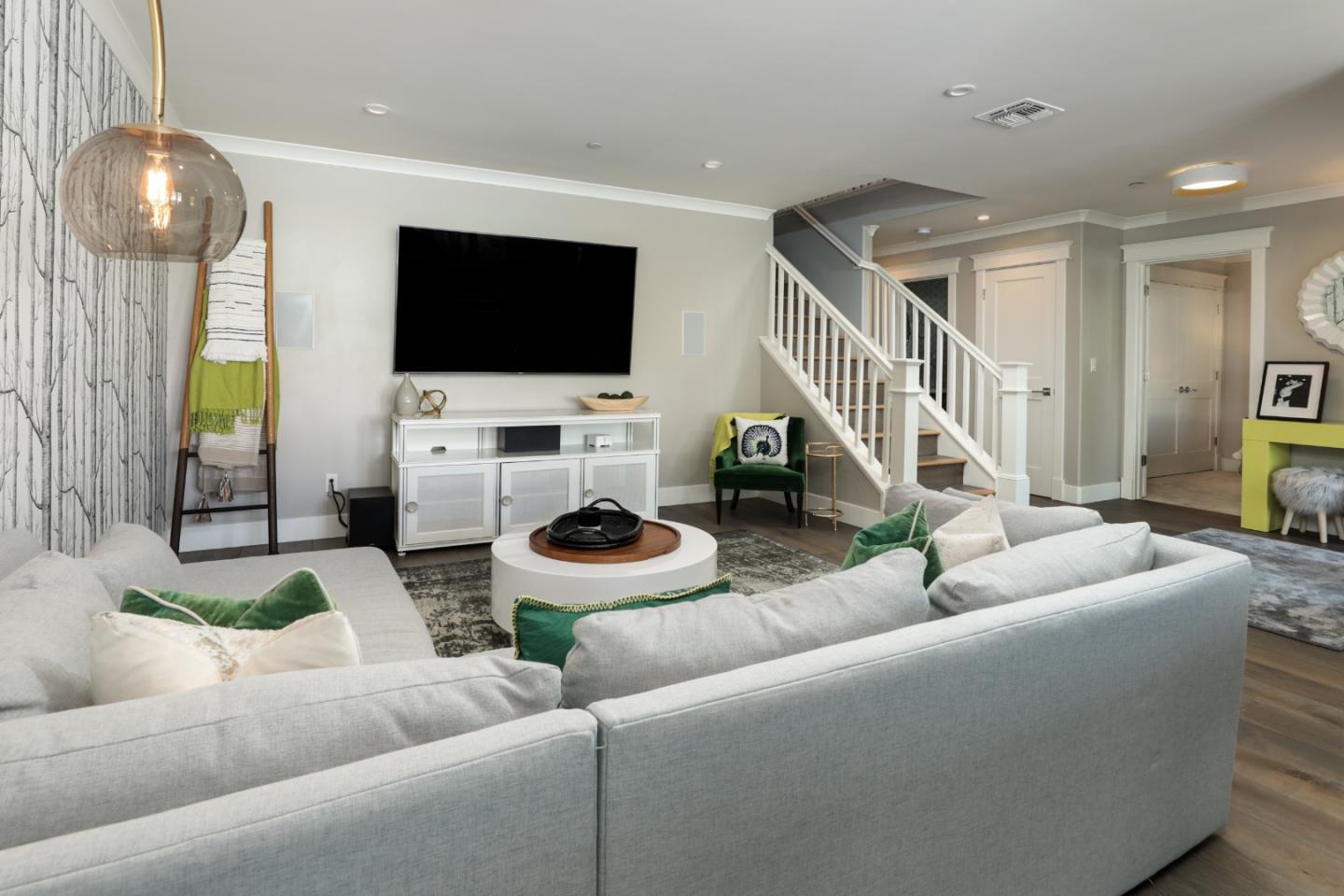 818 Crossway Road Burlingame, CA 94010 - Photo 24 of 50 a living room with furniture and a flat screen tv