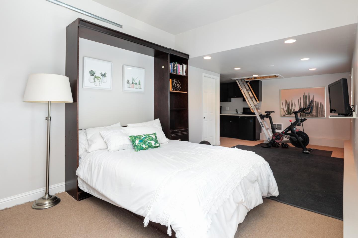 818 Crossway Road Burlingame, CA 94010 - Photo 25 of 50 a bedroom with bed and a night stand