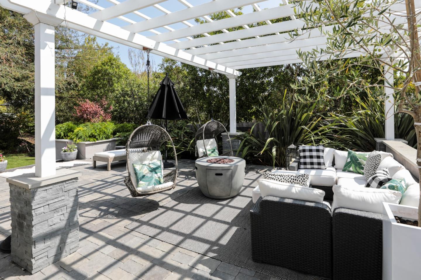 818 Crossway Road Burlingame, CA 94010 - Photo 29 of 50 a view of a patio with table and chairs potted plants and large tree