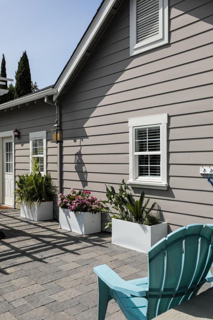 818 Crossway Road Burlingame, CA 94010 - Photo 40 of 50 a front view of a house with a chair