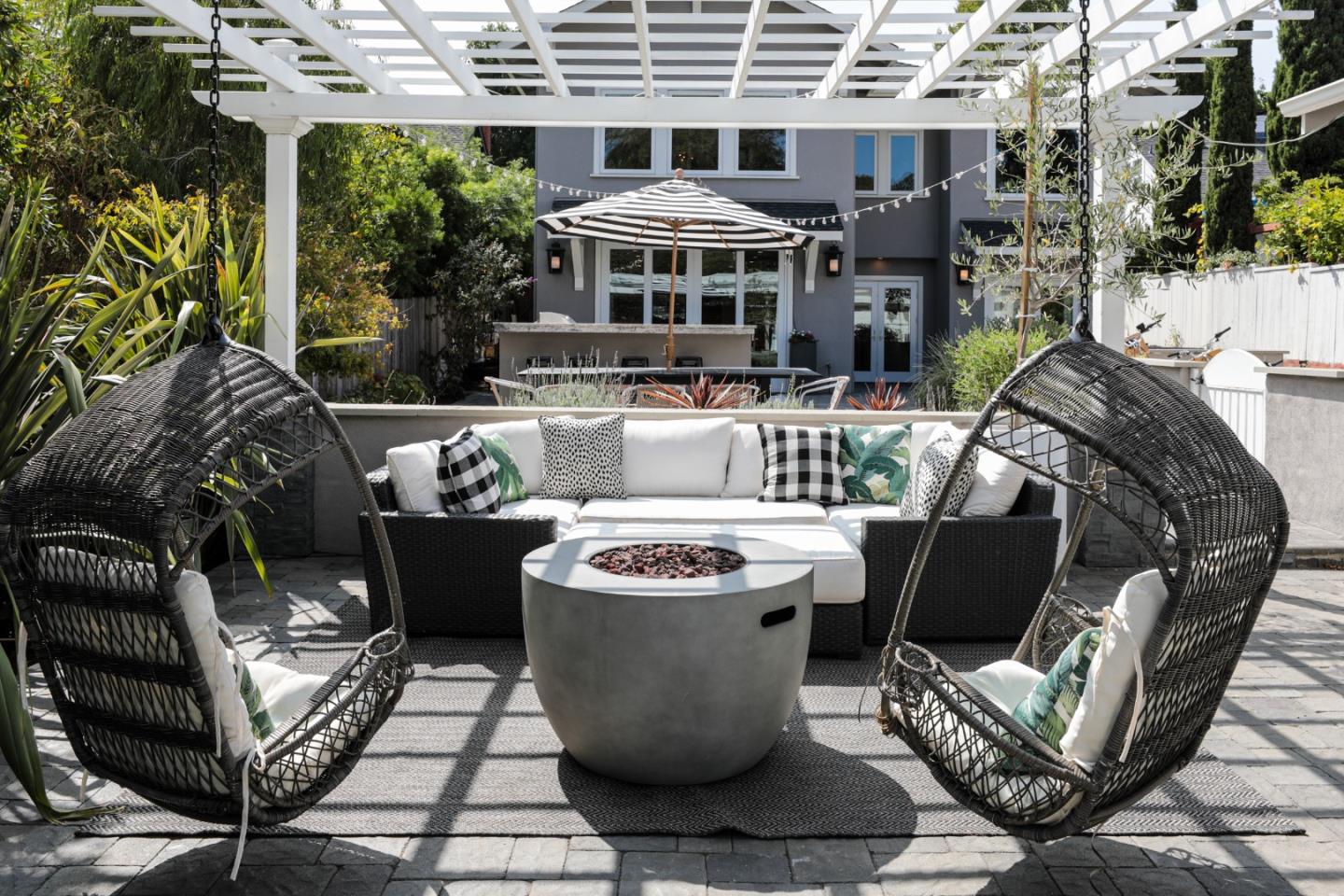 818 Crossway Road Burlingame, CA 94010 - Photo 41 of 50 a view of a patio with couches table and chairs and potted plants