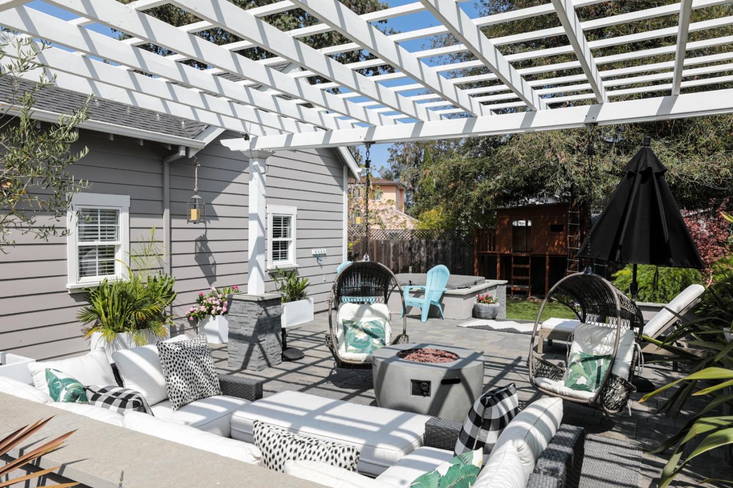 818 Crossway Road Burlingame, CA 94010 - Photo 47 of 50 a view of a chairs and table in patio