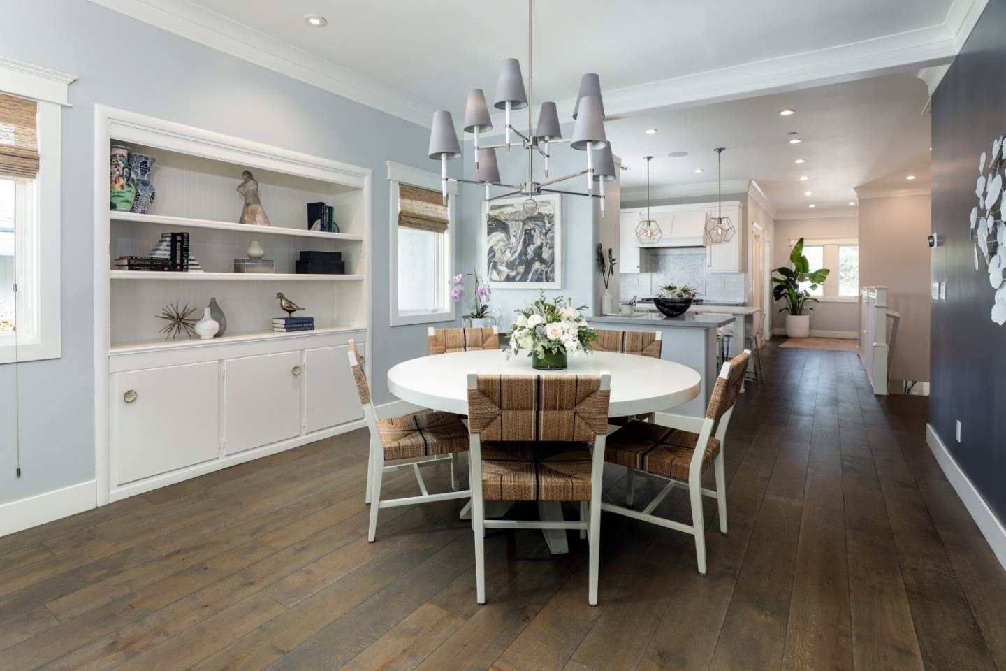 818 Crossway Road Burlingame, CA 94010 - Photo 6 of 50 a view of a dining room with furniture and wooden floor