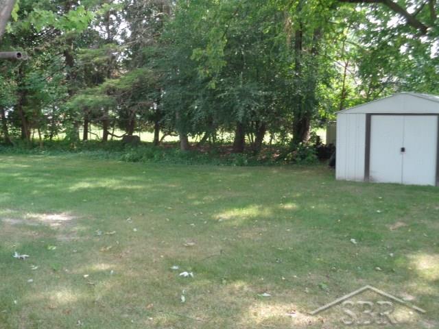 1400 North Center Road Saginaw, MI 48638 - Photo 30 of 31 Fenced Backyard w/Shed