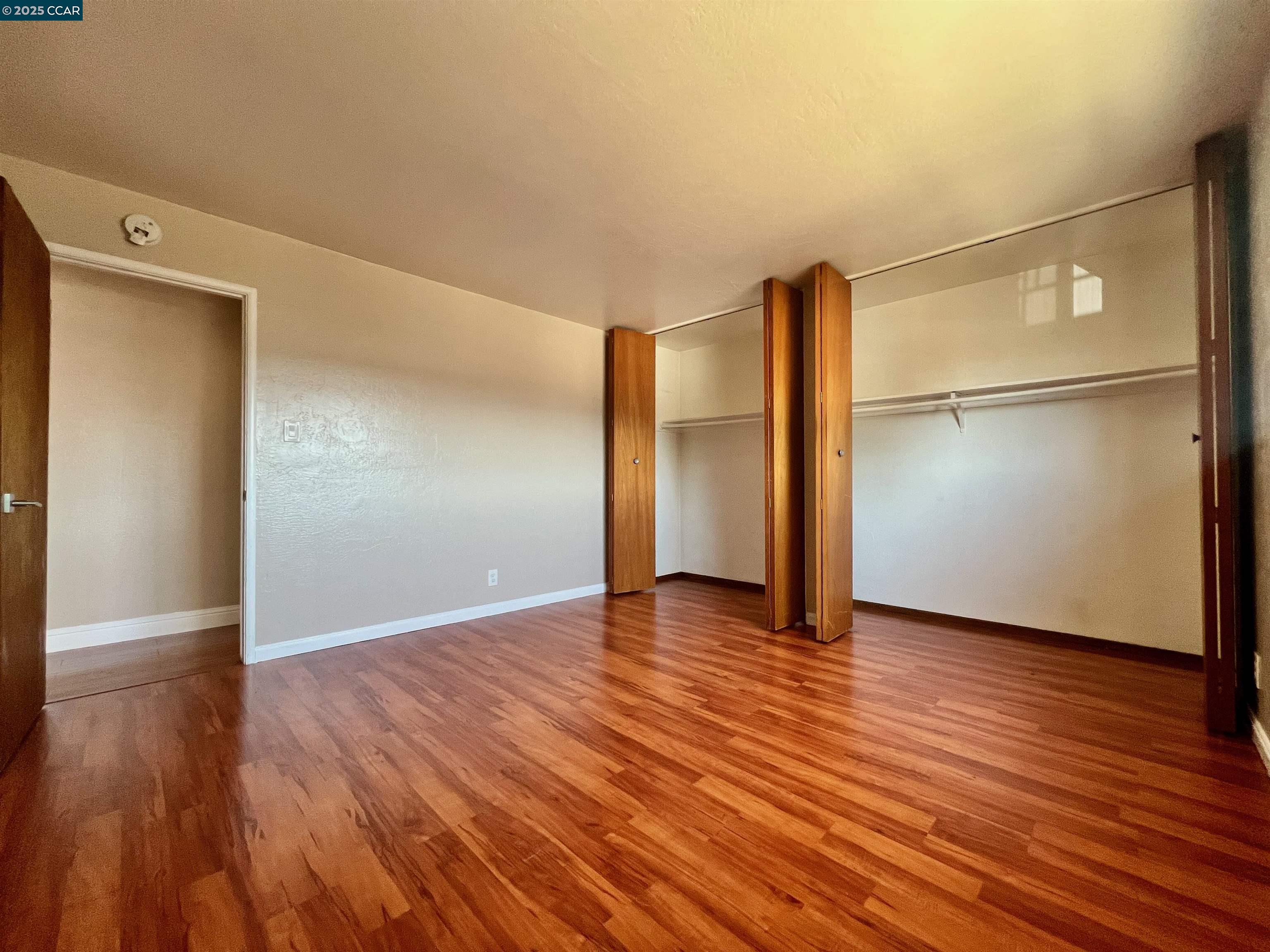 2546 Denning Court Castro Valley, CA 94546 - Photo 8 of 14 a view of empty room with wooden floor