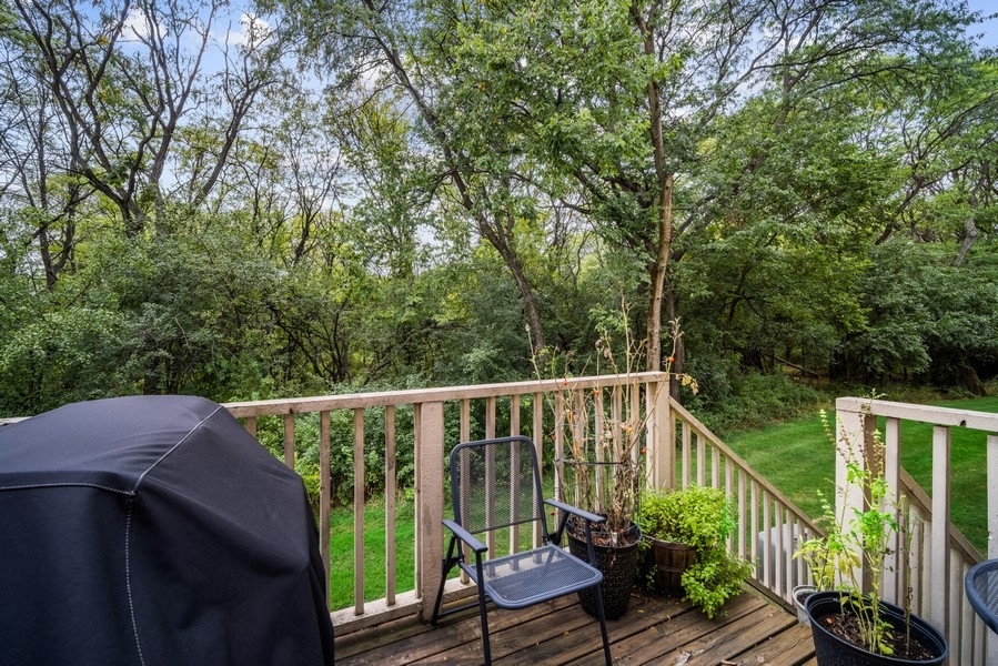 4643 Jenna Road Glenview, IL 60025 - Photo 14 of 17 a view of a balcony with wooden floor