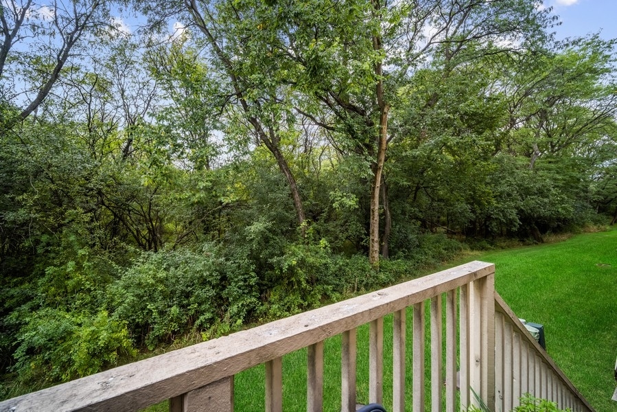 4643 Jenna Road Glenview, IL 60025 - Photo 16 of 17 a balcony with wooden floor and yard in the back