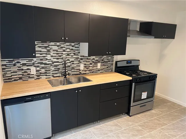 a bathroom with a sink vanity and a mirror