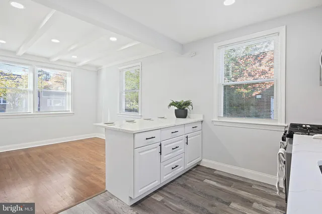 a room with window and cabinet